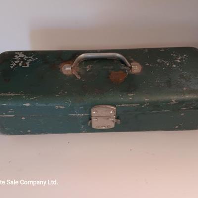 Vintage metal tacklebox with cork lined storage and some tackle.