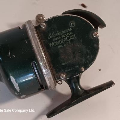 Two fishing reels Shakespeare push button Wondercast No. 1774 and green Fly fishing reel