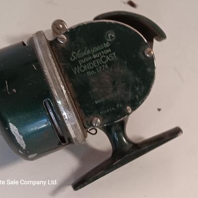 Two fishing reels Shakespeare push button Wondercast No. 1774 and green Fly fishing reel