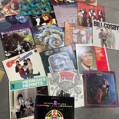 Vintage rock albums with green tote