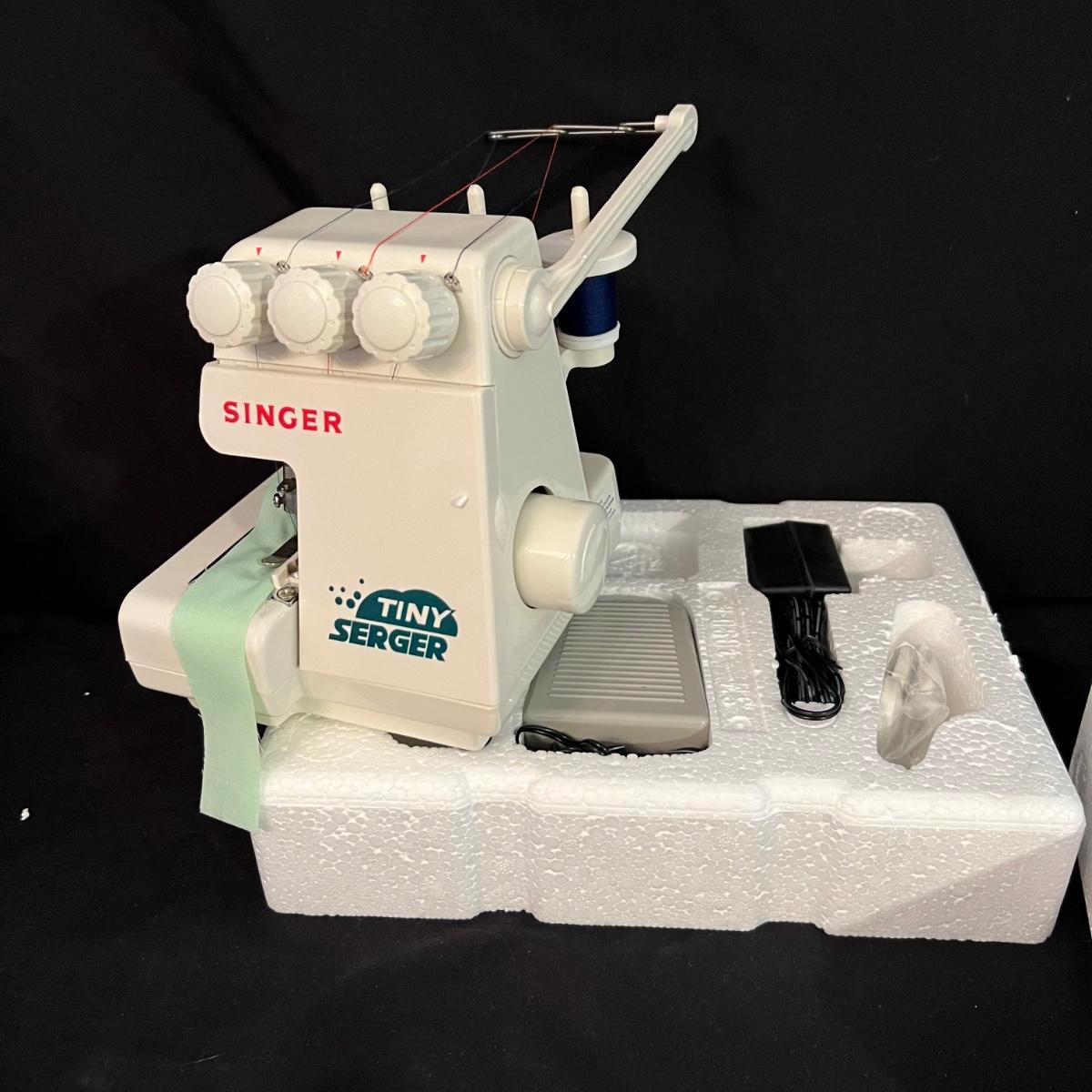 Singer Tiny Serger Overedging Machine (B2-RG) | EstateSales.org Singer Tiny Serger Overedging Machine (B2-RG) | EstateSales.org