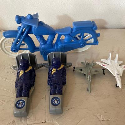 Plastic motorcycle and metal airplanes