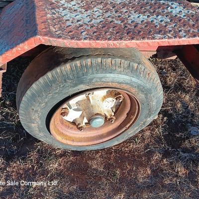 Old flatbed trailer good frame - bad tires and deck