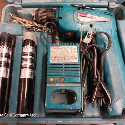 Makita Battery operated drill driver 6012HD with Fast charger, batteries and case.