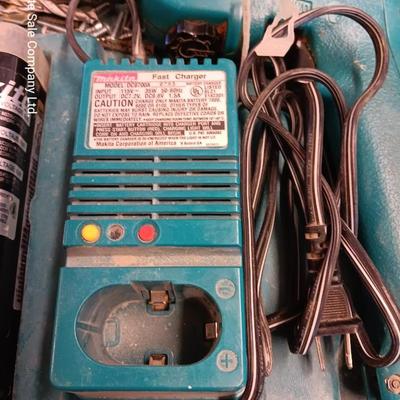 Makita Battery operated drill driver 6012HD with Fast charger, batteries and case.