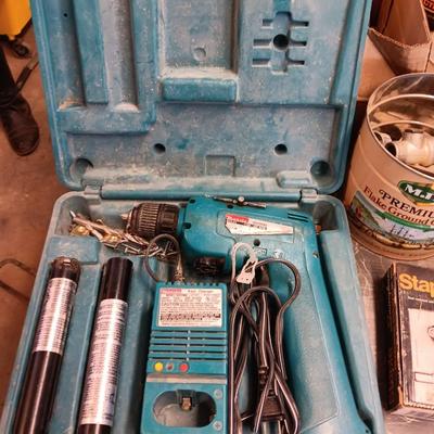 Makita Battery operated drill driver 6012HD with Fast charger, batteries and case.