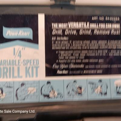 Electric 1/4" Varible-speed drill kit with case and contents