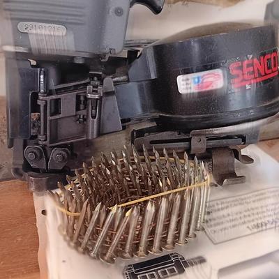 Senco Fastening systems SCN40R coil roofing Nailer with partial box of nails