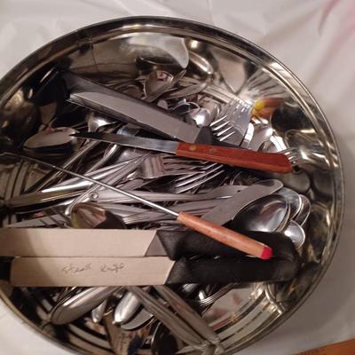 tin of silverware