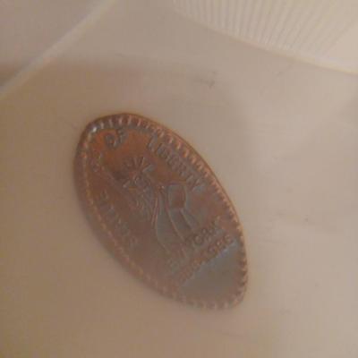 Glass trinket holder with magnifier bottom