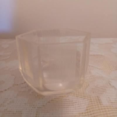 Glass trinket holder with magnifier bottom
