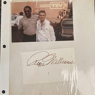Roger Williams photo album page with original signature