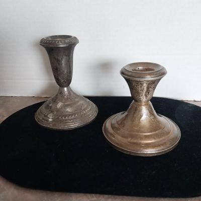 TWO STERLING SILVER (WEIGHTED) CANDLE STICK HOLDERS