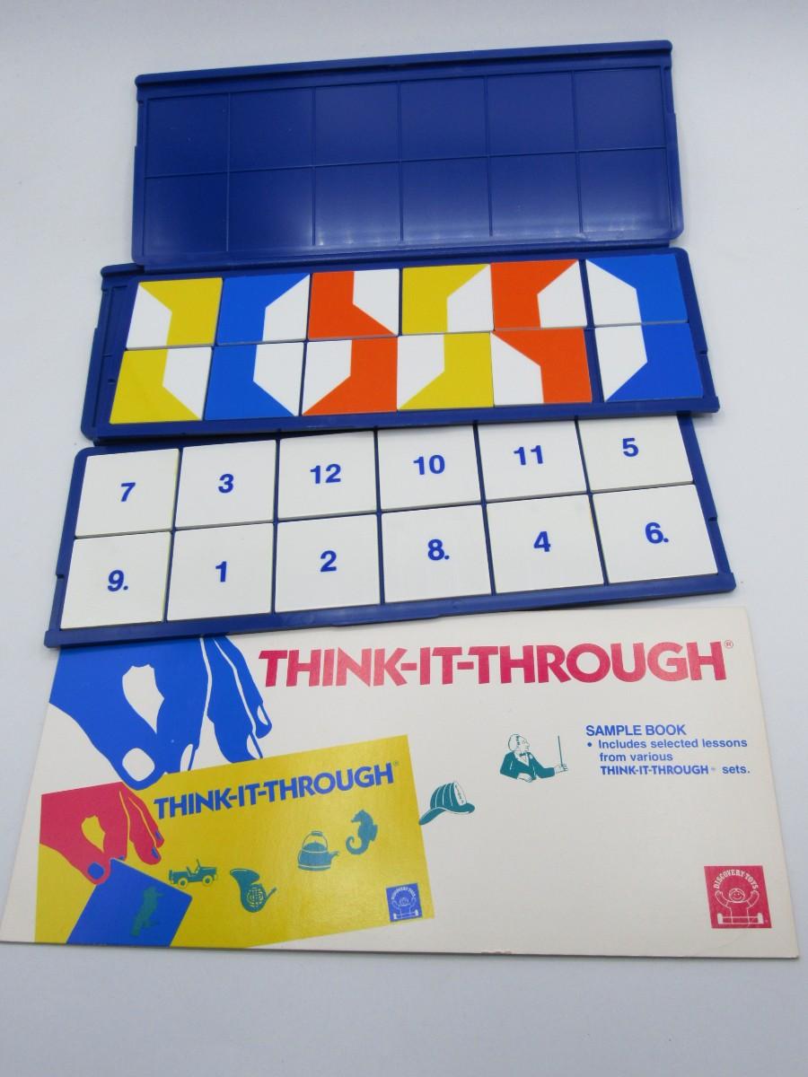 Pair of ThinkItThrough Tile Educational Games by Discovery Toys Inc