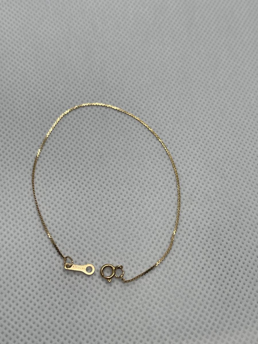 14k gold bracelet, thin | EstateSales.org