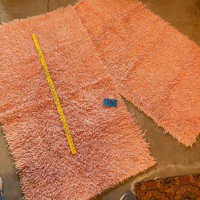 Peach colored shag rugs