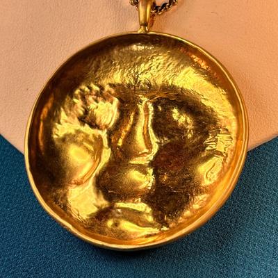 MAN IN THE MOON GOLDTONE PENDANT NECKLACE