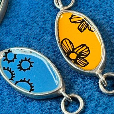 STERLING ARTISAN BRACELET WITH TWO-SIDED ENAMELED SEGMENTS WELL MADE