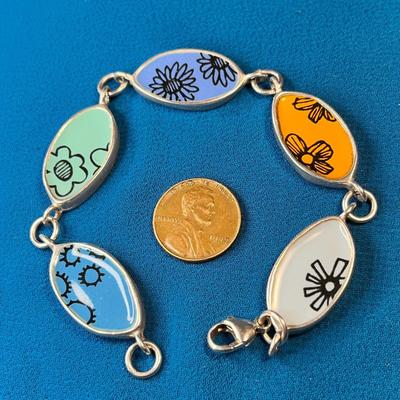 STERLING ARTISAN BRACELET WITH TWO-SIDED ENAMELED SEGMENTS WELL MADE