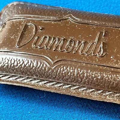 VINTAGE PLASTIC RAIN BONNET IN VINYL CASE MARKED "DIAMOND'S" 