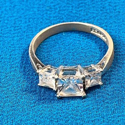 STERLING .925 RING WITH 3 CZ? PRONG SET STONES