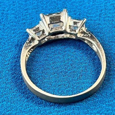 STERLING .925 RING WITH 3 CZ? PRONG SET STONES