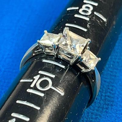 STERLING .925 RING WITH 3 CZ? PRONG SET STONES
