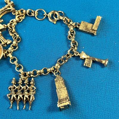 GOLDTONE NEW YORK CITY CHARM BRACELET: TIMES SQUARE, ROCKETTES, BROOKLYN BRIDGE, ETC.