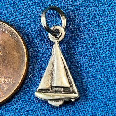 SAILBOAT CHARM UNMARKED BUT PROBABLY SILVER