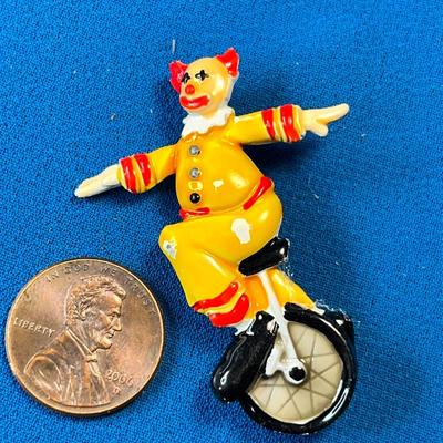 CLOWN ON UNICYCLE PIN