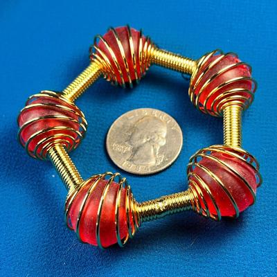 FUNKY GOLD SPIRAL BRACELET WITH RED BALLS INSIDE SPIRALS   OUT OF THIS WORLD!
