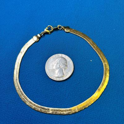 BRIGHT GOLDTONE HERRINGBONE PATTERN BRACELET BY AVON