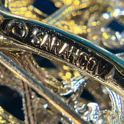 SARAH COVENTRY FLOWER PIN WITH REDDISH IRIDESCENT RHINESTONES 