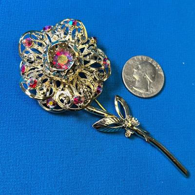 SARAH COVENTRY FLOWER PIN WITH REDDISH IRIDESCENT RHINESTONES 