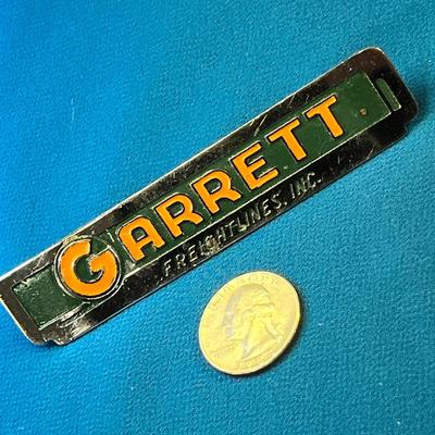 VINTAGE GARRETT FREIGHTLINES ENAMELED METAL UNIFORM BADGE