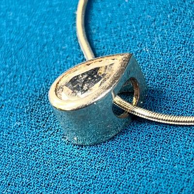 .925 STERLING NECKLACE WITH CORD-LIKE CHAIN AND TEARDROP DIAMOND-LIKE PENDANT