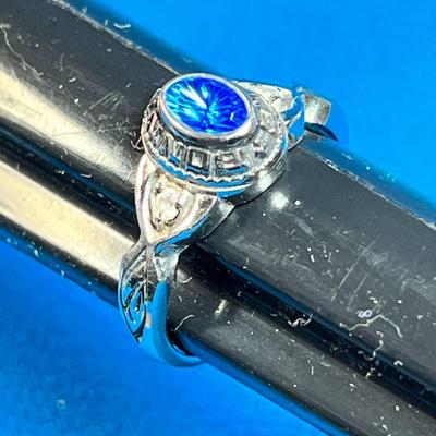 1989 BONNEVILLE HIGH SCHOOL RING, BLUE OVAL STONE, INSCRIBED WITH NAME INSIDE