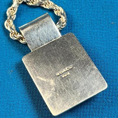 MODERNISTIC SILVER PENDANT NECKLACE WITH PALE TURQOISE INSET STONE, TWISTY CHAIN