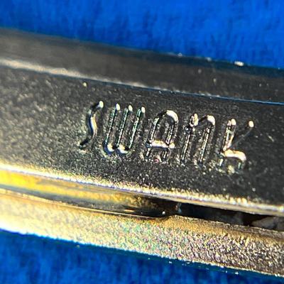 GOLDTONE SCIMITAR WITH BLUE STONE TIE BAR by SWANK