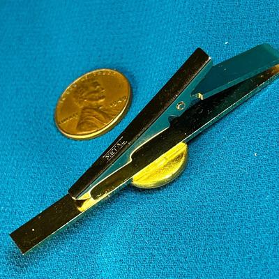 THREE GOLDTONE CROWNS ON DEEP BLUE STONE MEDALLION TIE CLIP