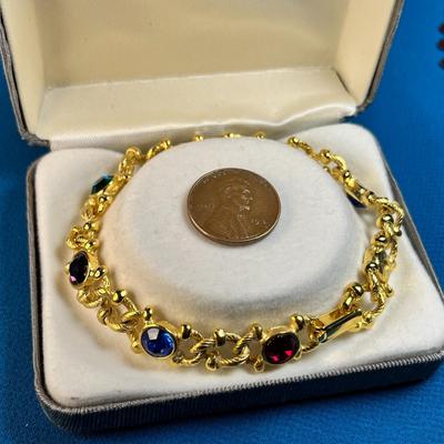 BRIGHT GOLDTONE KNOTTED LINK BRACELET WITH COLORFUL INSET RHINESTONES IN ORIGINAL BOX
