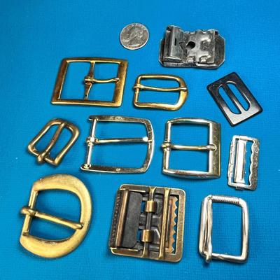 GROUP OF 11 DIFFERENT METAL BELT BUCKLES EXCEPT ONE BLACK PLASTIC