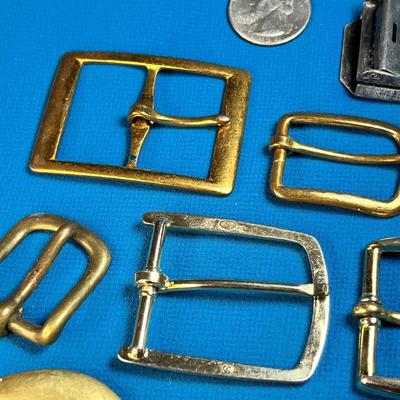 GROUP OF 11 DIFFERENT METAL BELT BUCKLES EXCEPT ONE BLACK PLASTIC