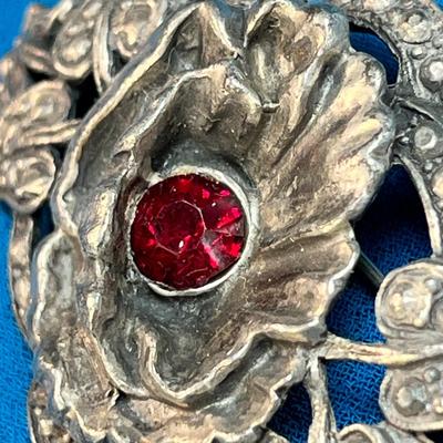 FANCY 3-D FLOWER PIN WITH RED RHINESTONE CENTER AND INTRICATE LEAVES