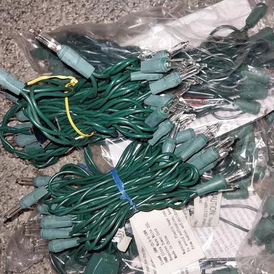 OVER 30 SMALL STRANDS OF NEW LIGHTS