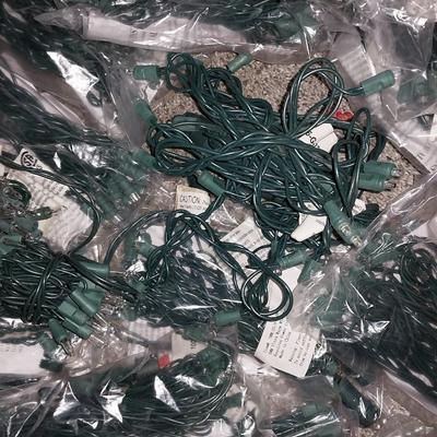 OVER 30 SMALL STRANDS OF NEW LIGHTS