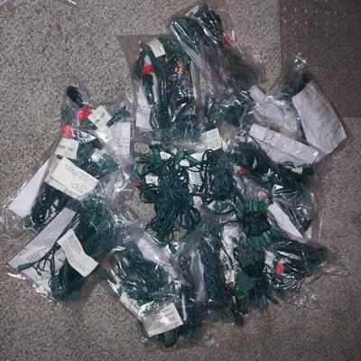 OVER 30 SMALL STRANDS OF NEW LIGHTS
