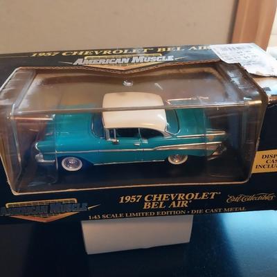 TWO '57 CHEVY BEL-AIR ORNAMENTS AND A DIE-CAST MODEL