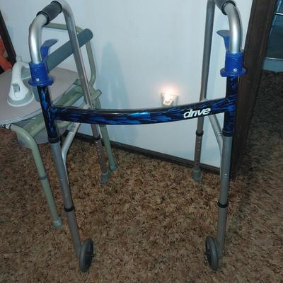 FOLDING WALKER, BEDSIDE POTTY AND A SUCTION CUP WALL GRABBER