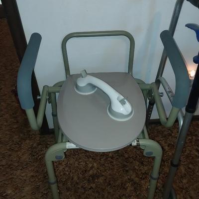 FOLDING WALKER, BEDSIDE POTTY AND A SUCTION CUP WALL GRABBER
